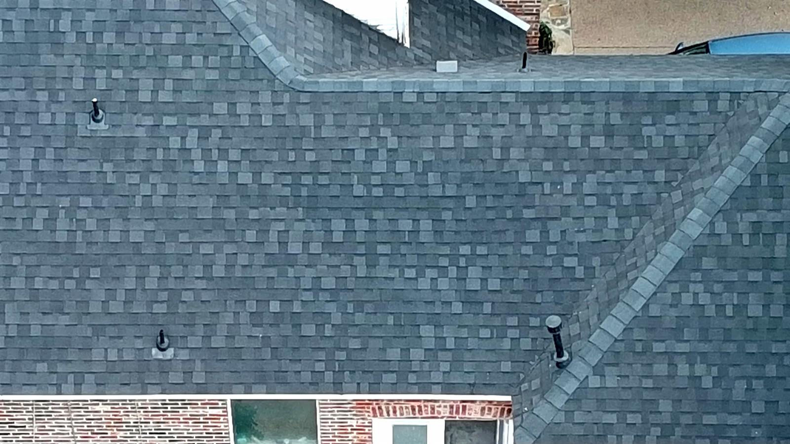 After: seamless Class 4 shingle roof, fully matched