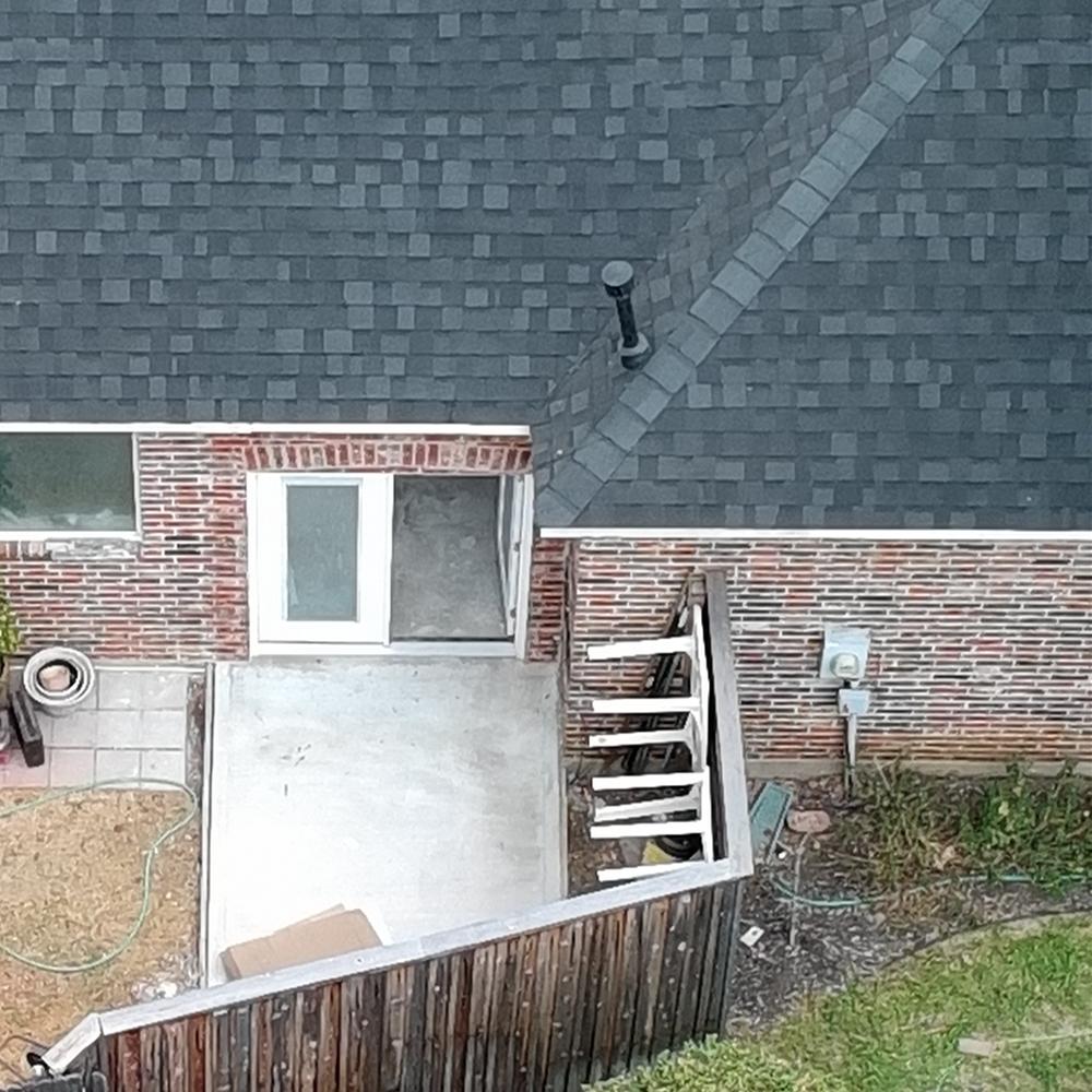 After: clean shingle valley and new patio entry